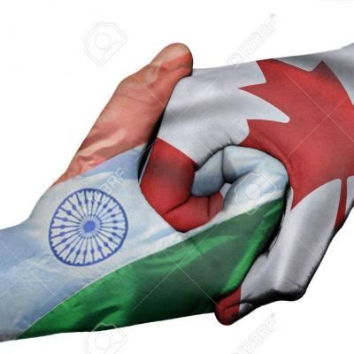 30154311 poignee de main diplomatique entre les pays les drapeaux de l inde et du canada en surimpression les
